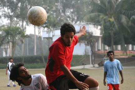 Another head-shot Up in the air to take charge of the ball.