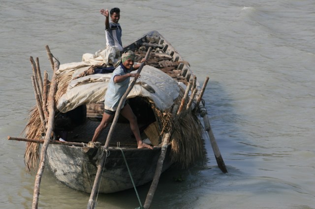 On the River Fisherman on a boat we were passing!