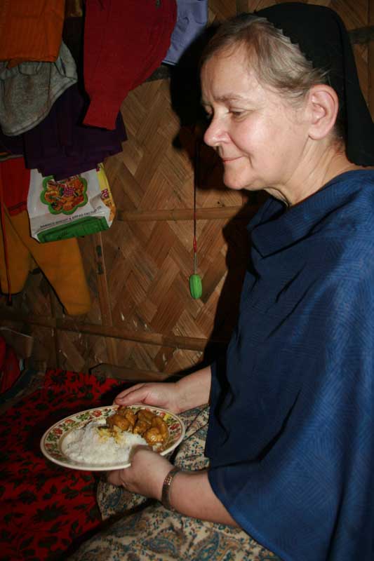 Alice ready to enjoy her Curry dish.