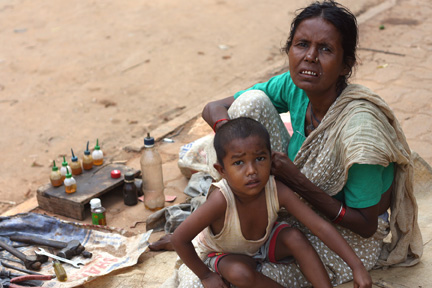 Rickshaw Mechanic and child.