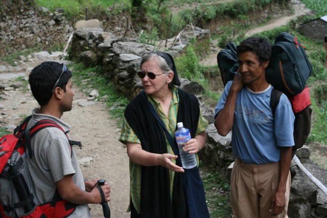 The trekker explaining something.