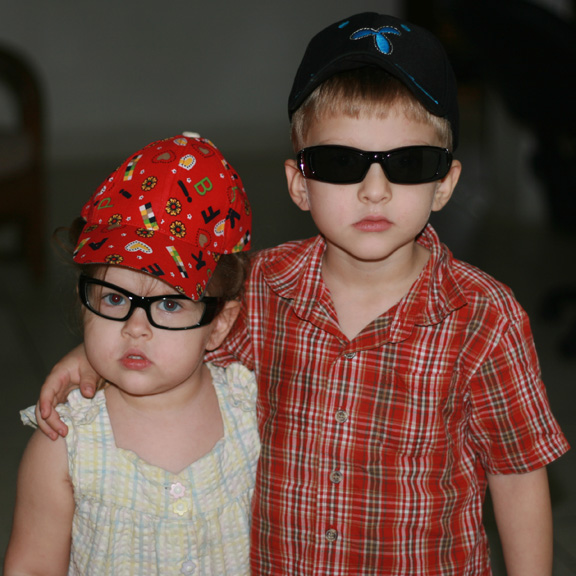 Proudly wearing their new glasses and caps! Proudly wearing their new glasses and caps!