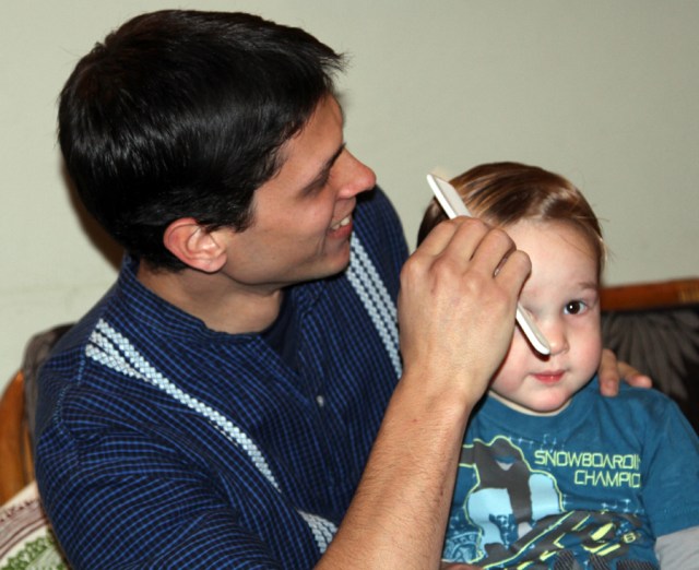 Little brother thinks he also needs to be combed!