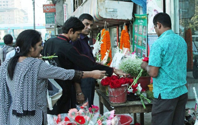 Flower Vendor selling lots of flowers!