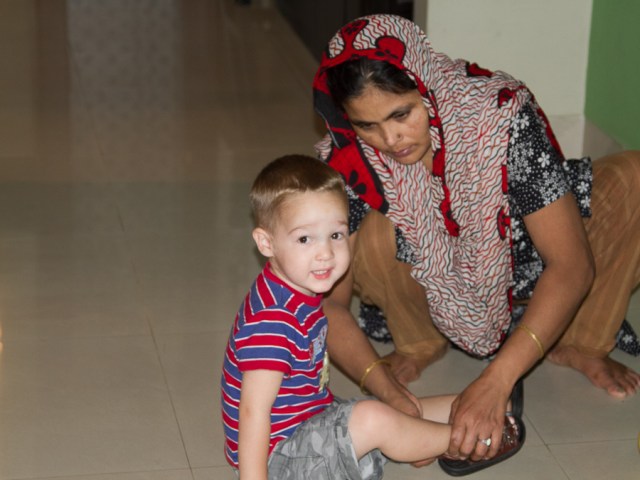Auntie gets to help Caden with sandals one last time.