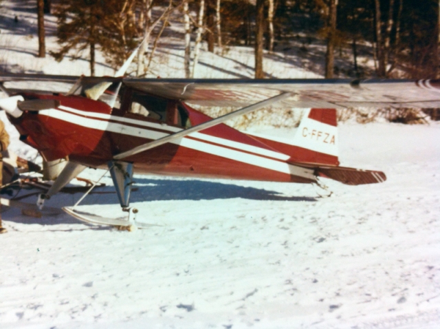 The plane I flew in NW Ontario, parked on the lake and ready to go.