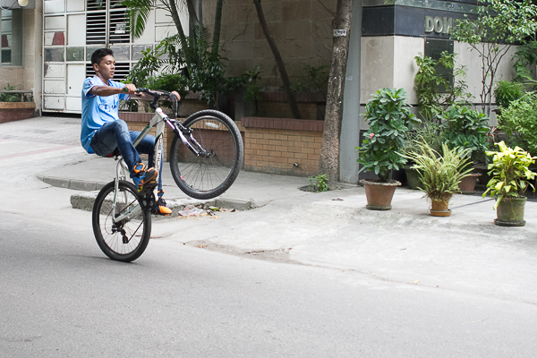 Bicyclist with Blue Shirt