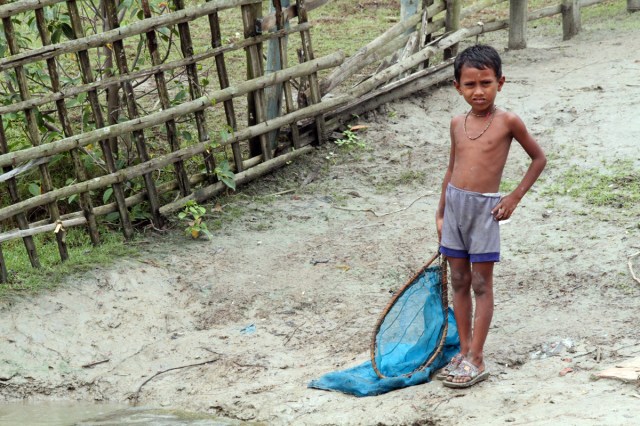 Boy With Fishing Net
